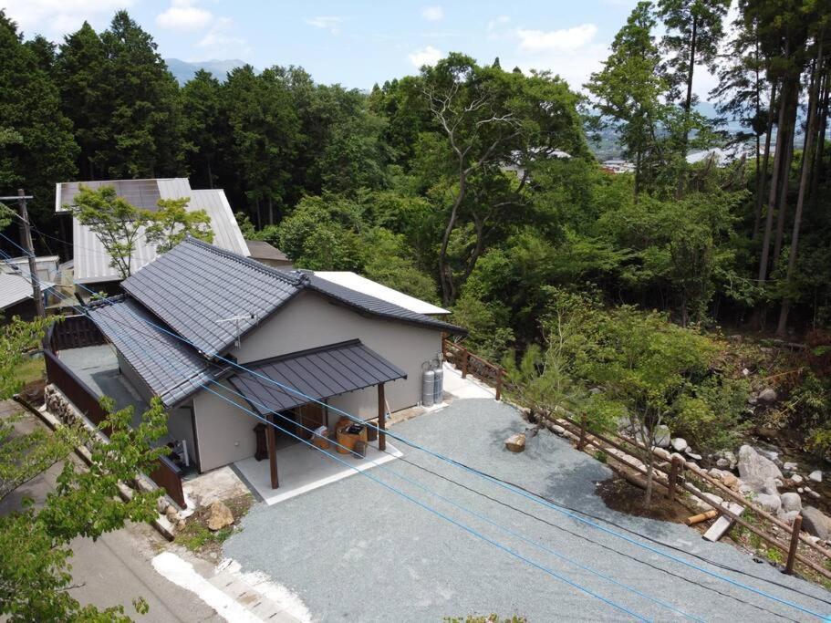 【コテージくぎの】大谷川沿いの露天風呂があるコテージ Minamiaso Exterior photo